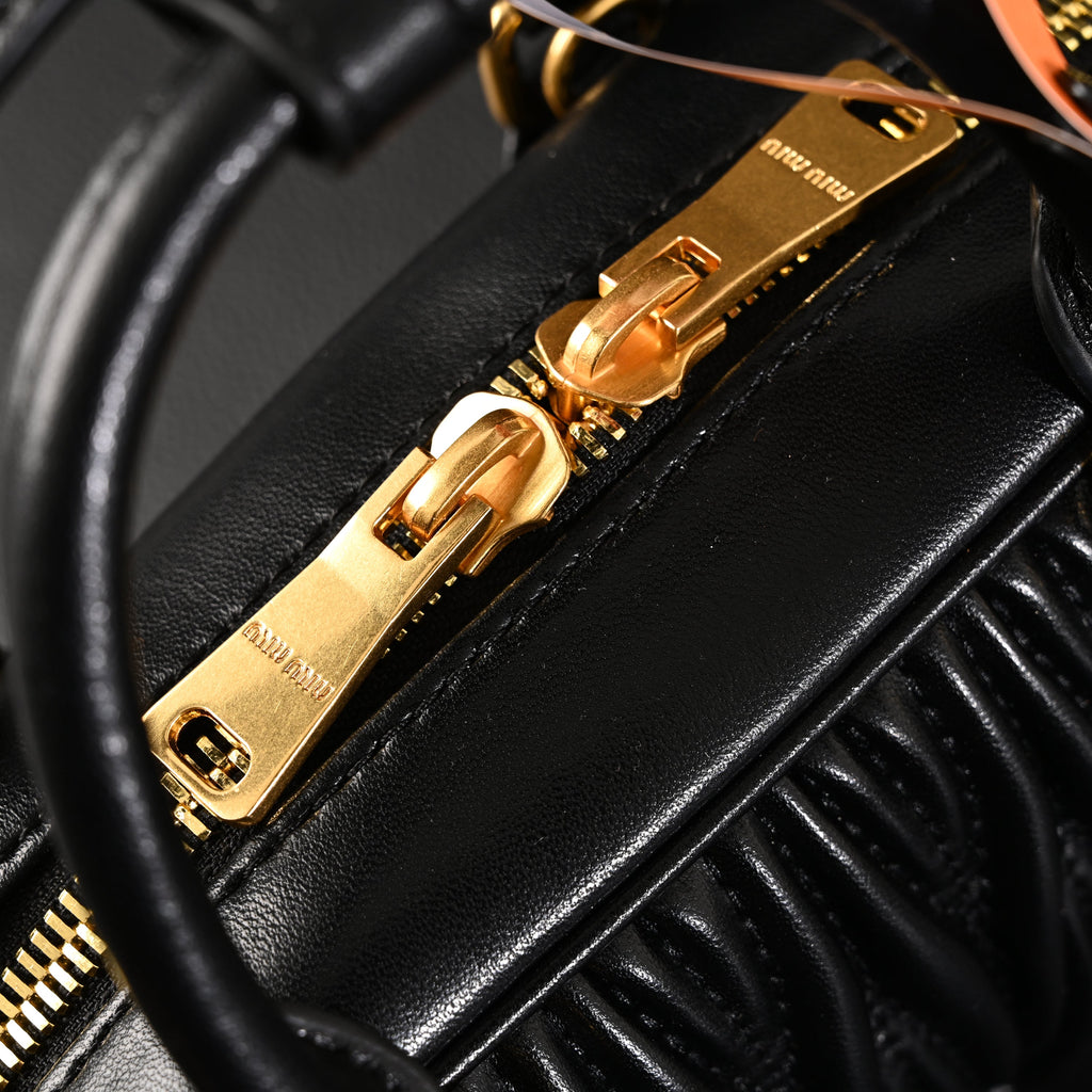 Miu Miu Black Matelassé Leather Top Handle Bag